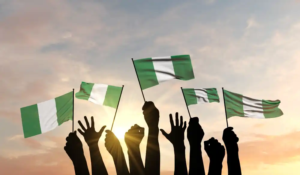 silhouette-arms-raised-waving-nigeria-flag-with-pride-d-rendering.webp