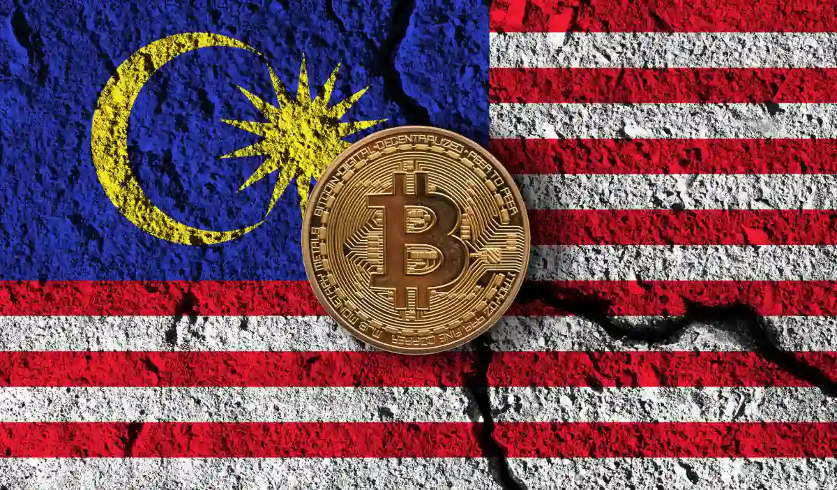 bitcoin-crypto-currency-coin-with-cracked-malaysia-flag-crypto-restrictions.webp