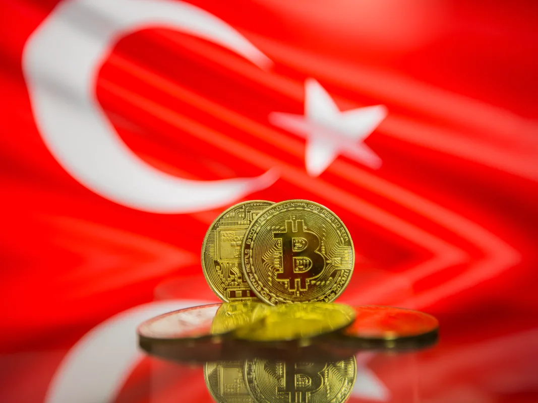 bitcoin-gold-coin-defocused-flag-turkey-background-virtual-cryptocurrency-concept.webp